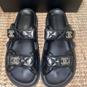 Authentic CHANEL Black Quilted Dad Sandals in a very good condition in size 39